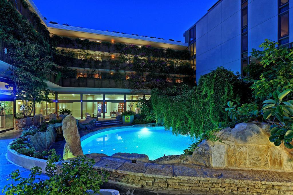 Sitia Beach City Resort & Spa Bagian luar foto The pool at the hotel